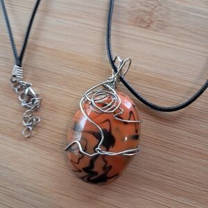 Elegant Wire-Wrapped Orange and Black Pendant Necklace